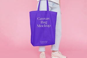 Front View of Handholding Canvas Jeans Bag Mockup