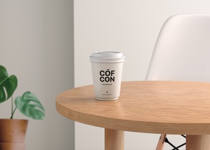 Front View of Paper Coffee Cup Mockup on Table