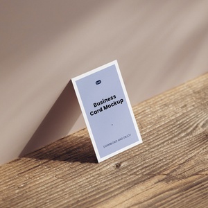 Perspective Sight of Business Card Mockup on Wood Table