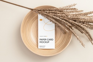Top View of Modern Vertical Paper Card Mockup on Plate