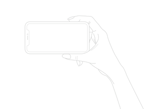 iPhone X sostenido en la mano en modo paisajista